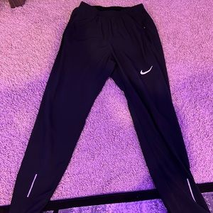Black small Nike Zipper Joggers